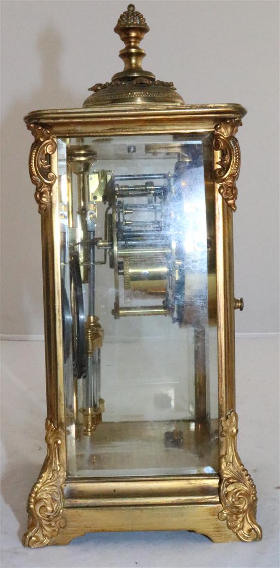 An early 20th century French ormolu four glass mantel clock, height 10in.
